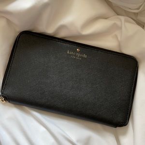 Kate Spade “travel wallet”